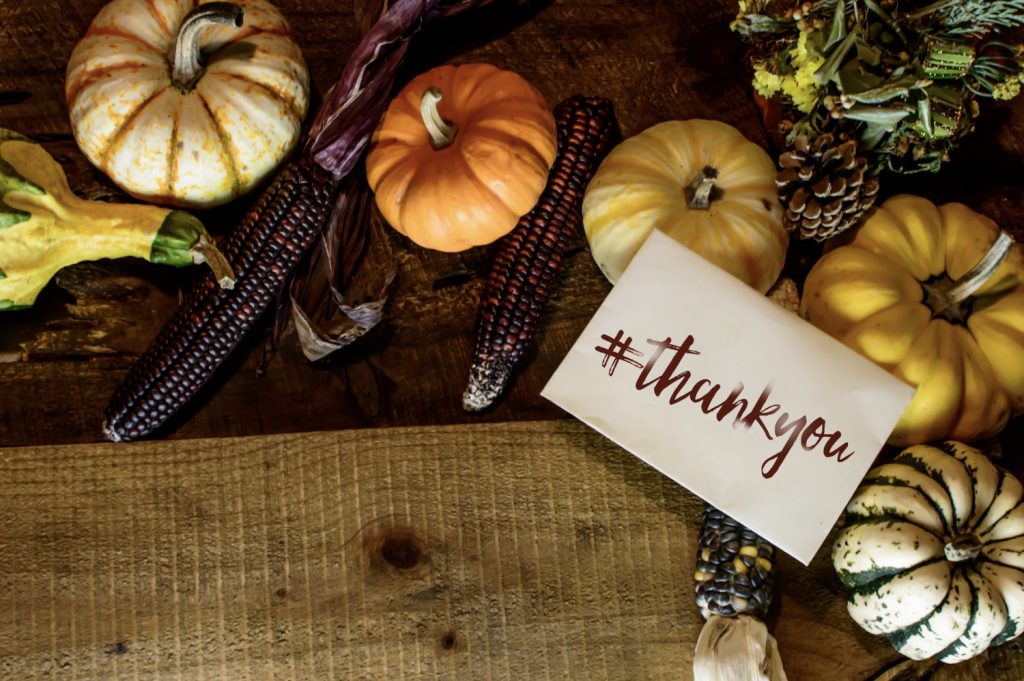 Thank you Thanksgiving card background in rustic wood hashtag #thankyou social network or greeting
